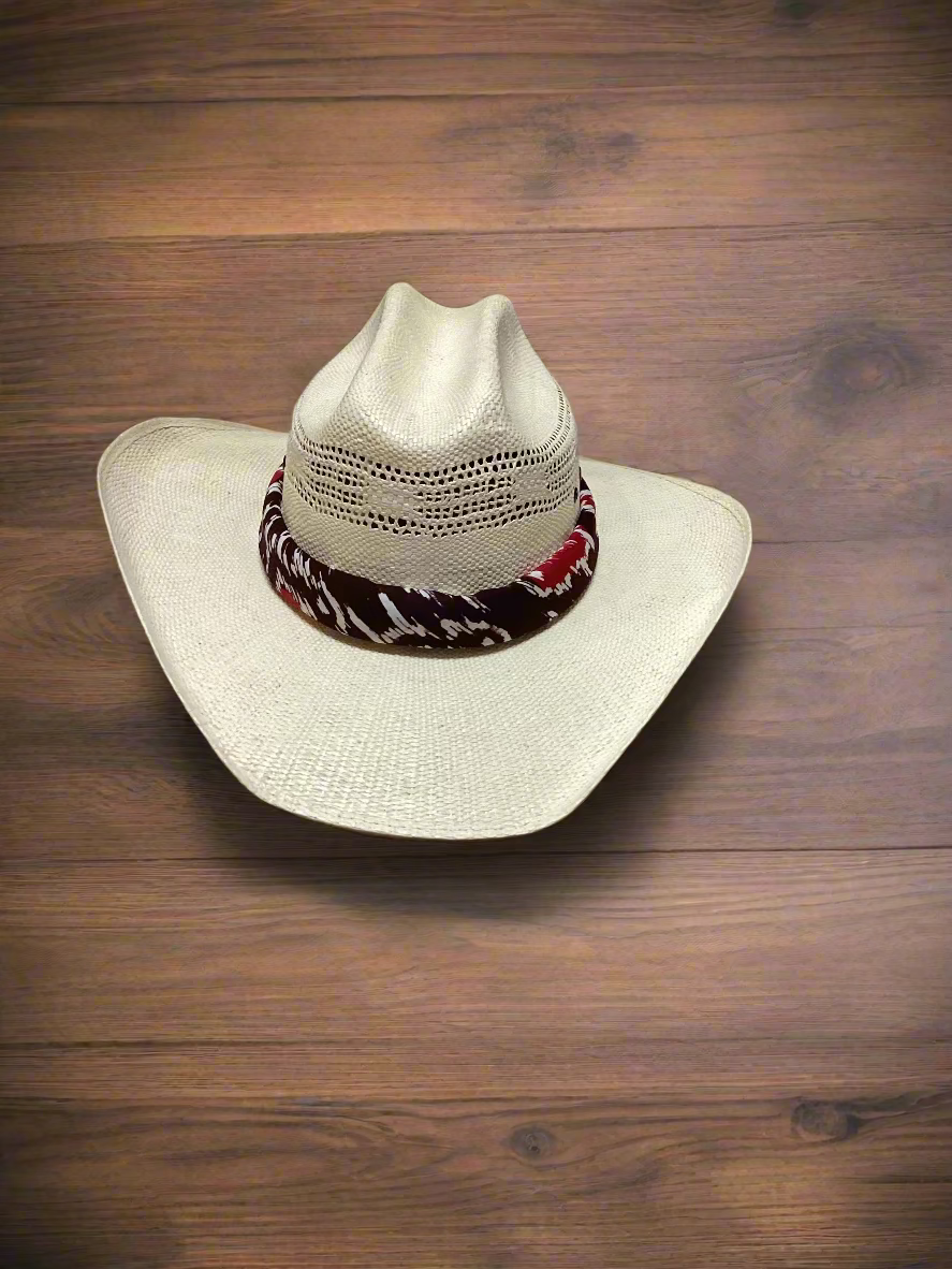 Beige cowboy hat with a colorful band on a wooden surface