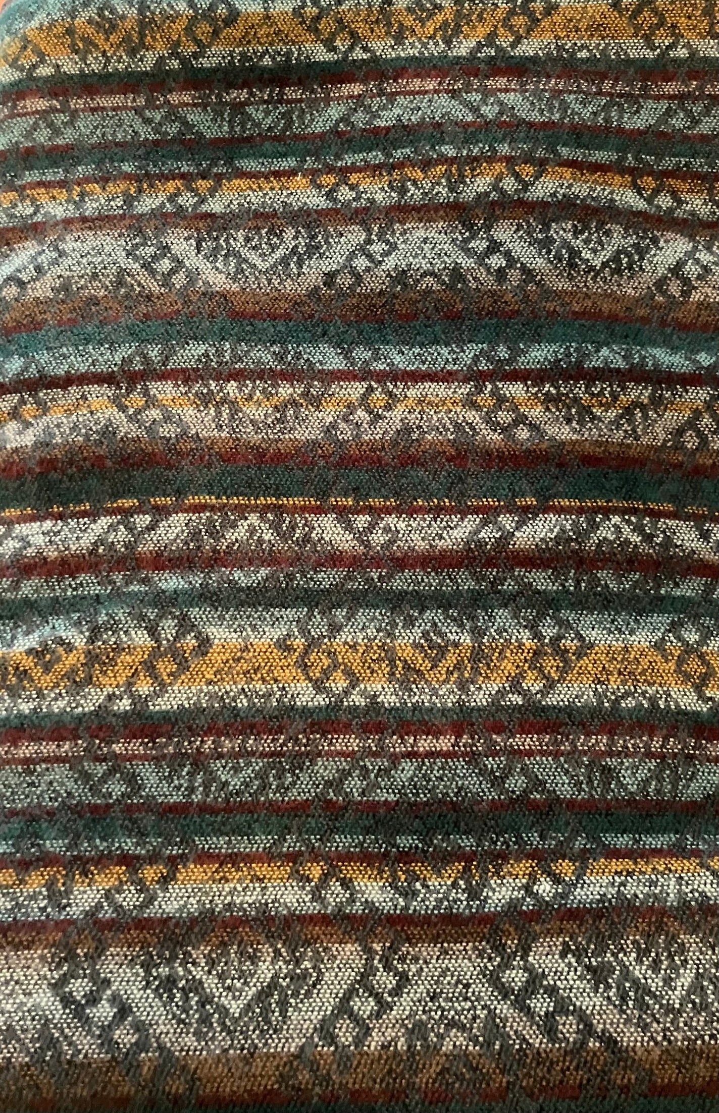 Textile with a pattern of horizontal stripes in various colors