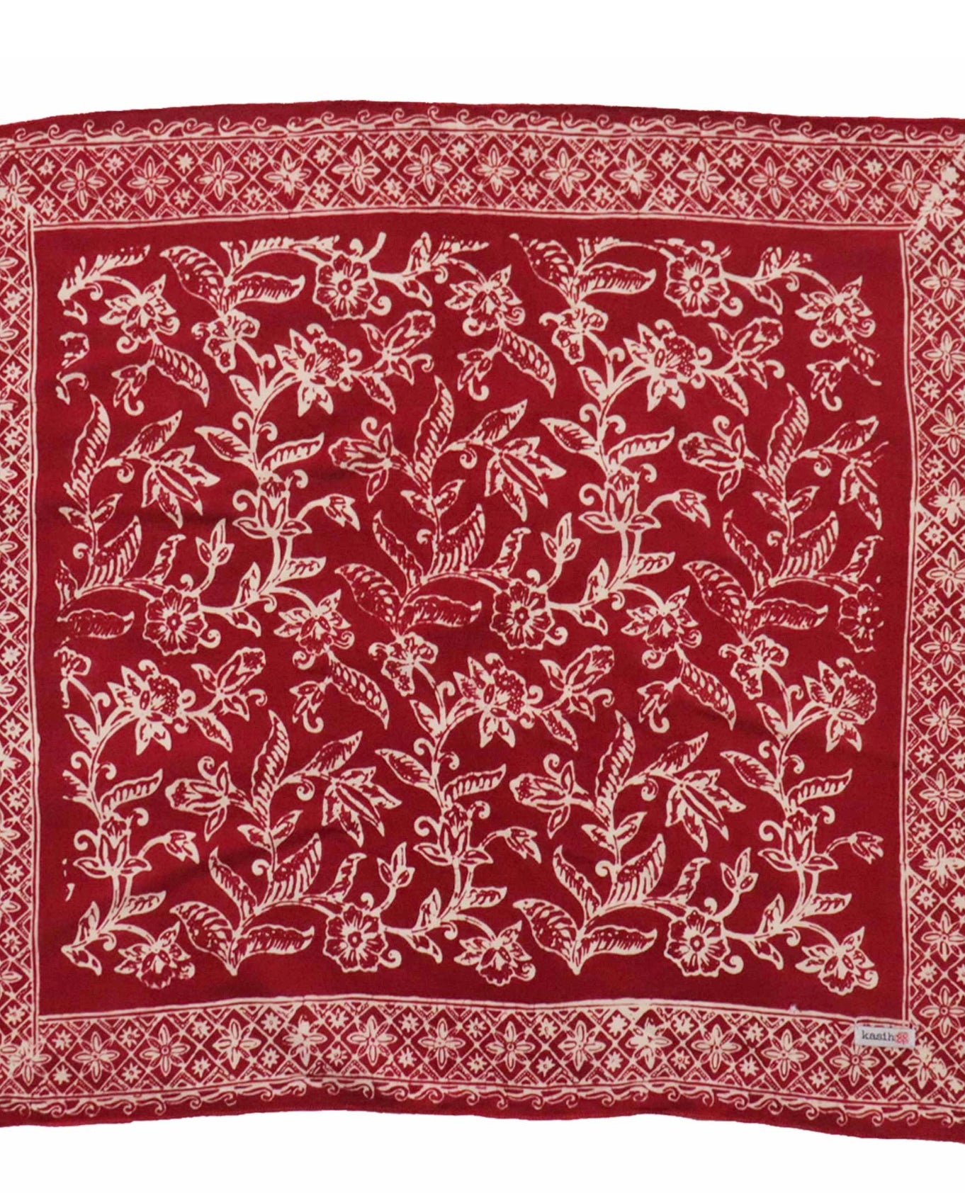 Red white bandanna with white floral pattern on a white background