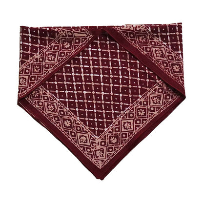 Maroon bandana with white geometric pattern on a white background