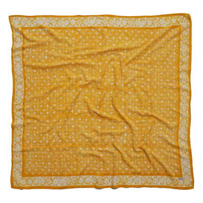 Yellow fabric with white pattern on a white background