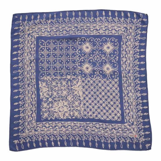 Blue bandana with white patterns on a white background