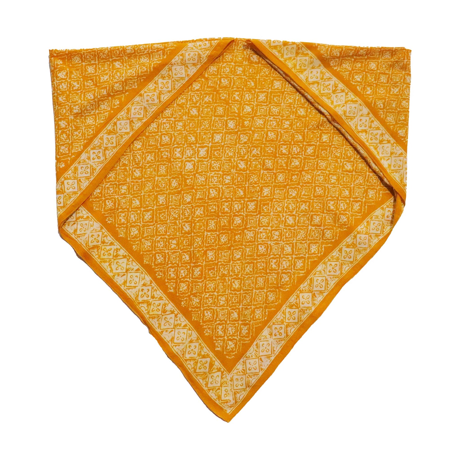 Yellow fabric with white geometric pattern on a white background