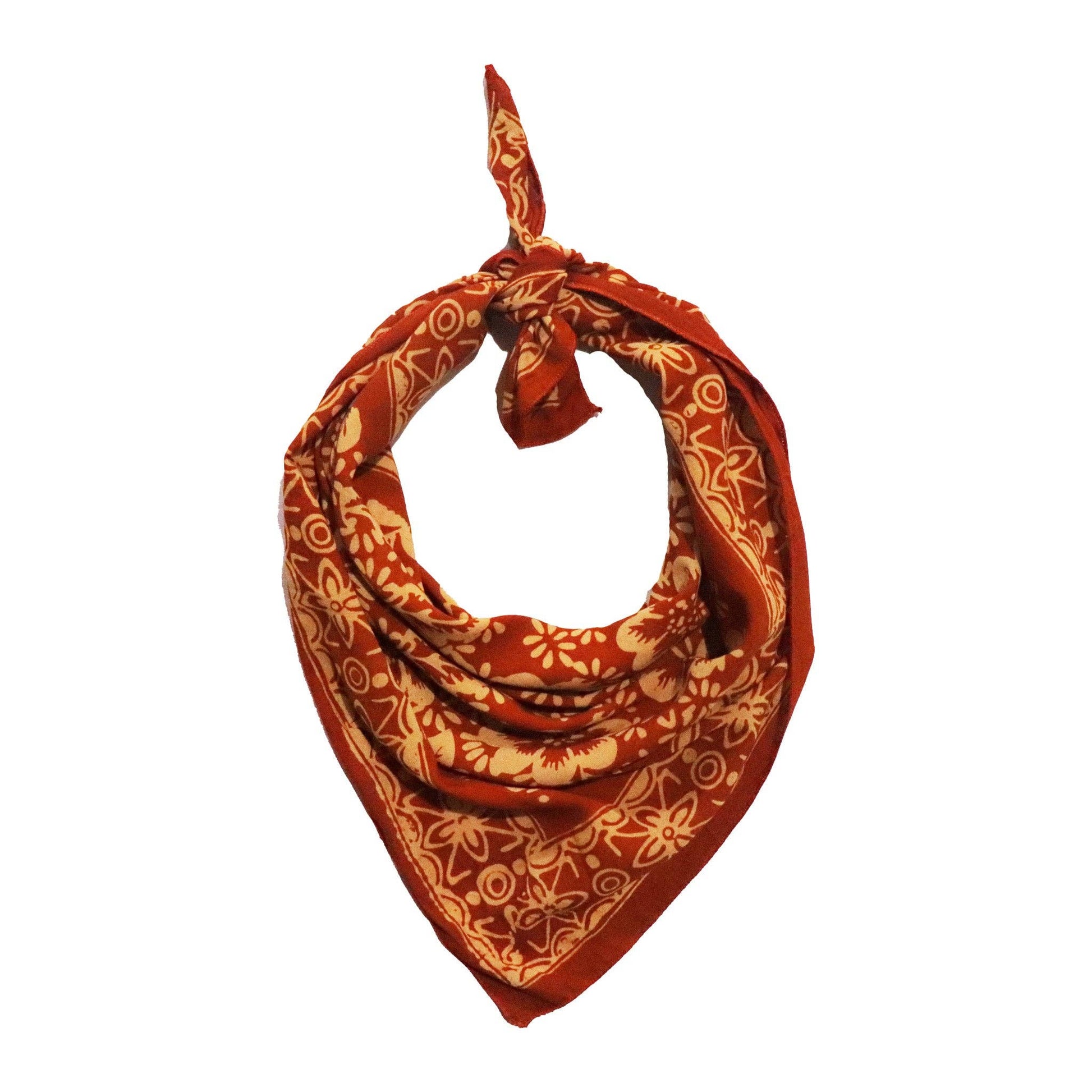 Orange bandana with a pattern on a white background