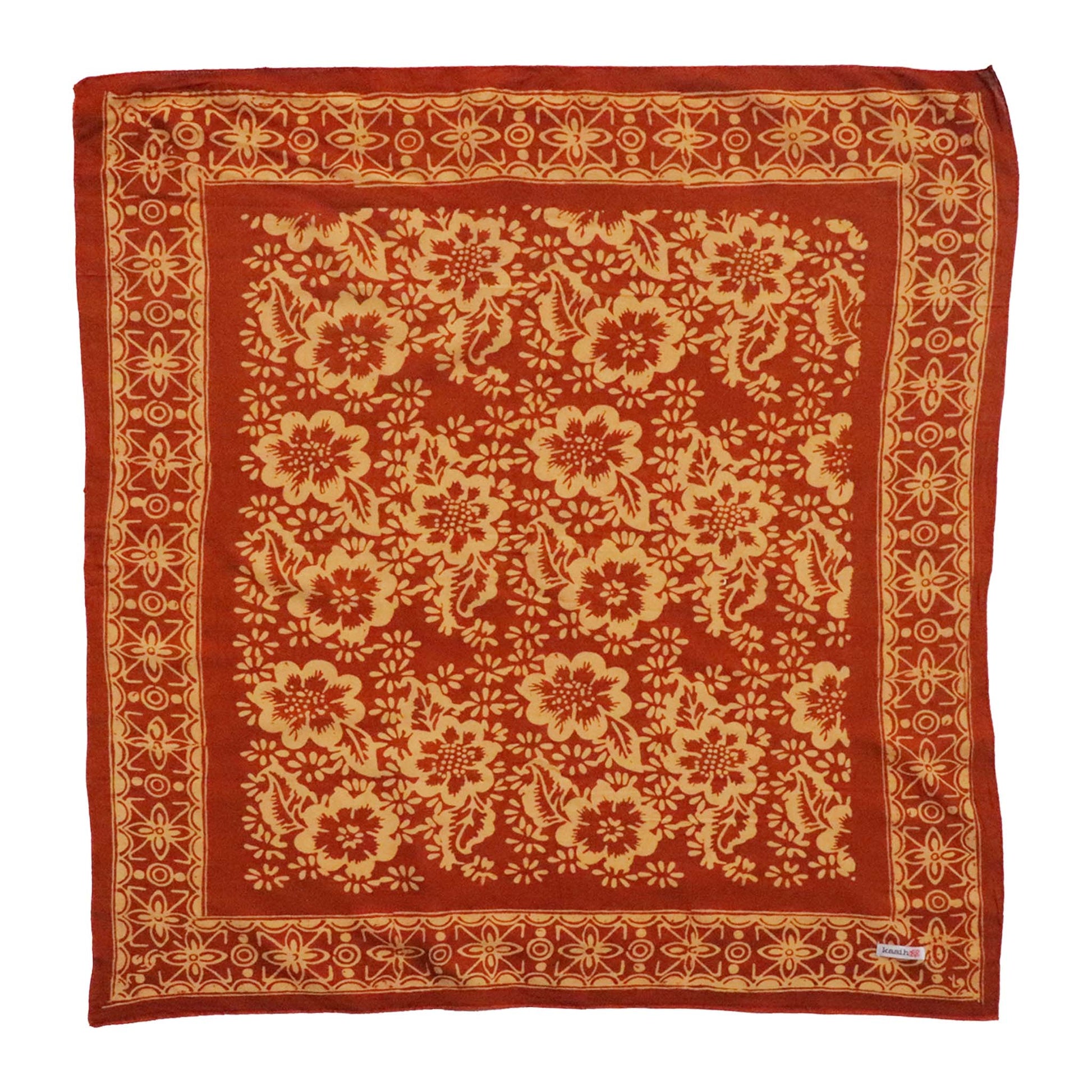 Red scarf with beige floral pattern on a white background