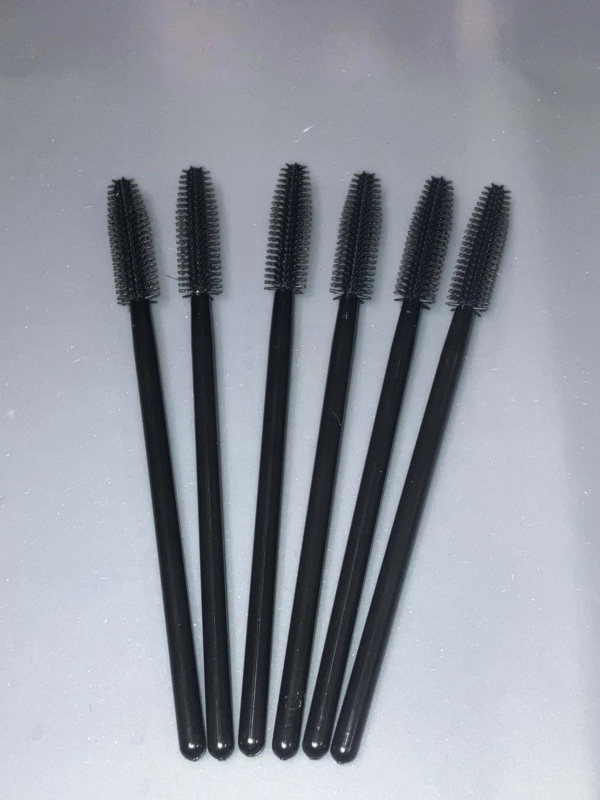 Mascara brush cleaning brush