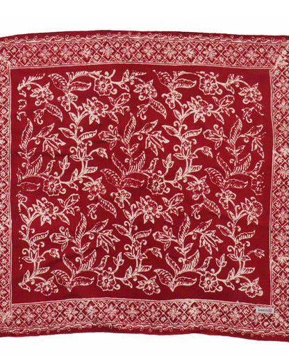 Red white bandanna with white floral pattern on a white background