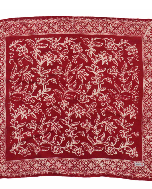 Red white bandanna with white floral pattern on a white background