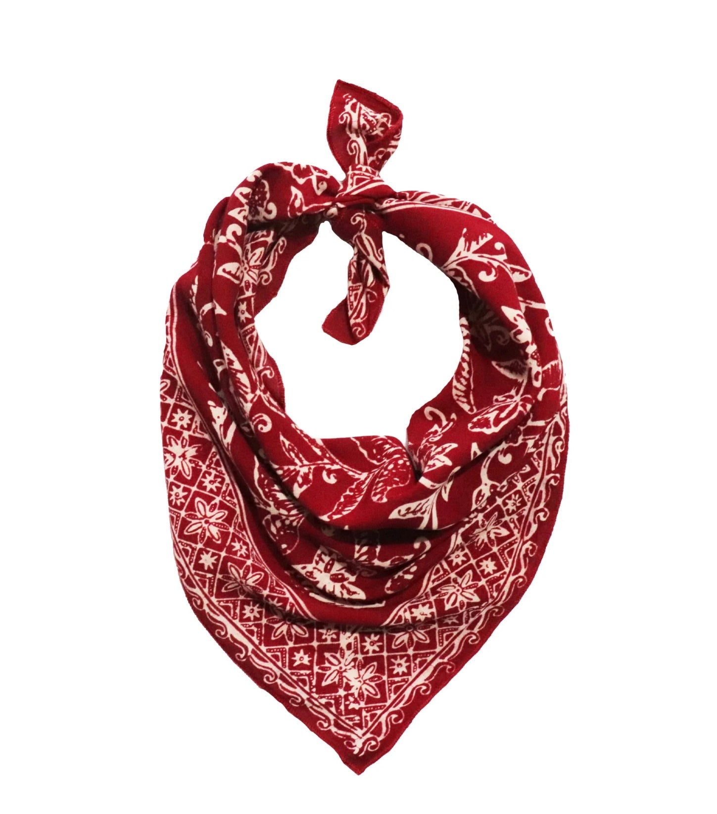 Red bandana with white patterns on a white background
