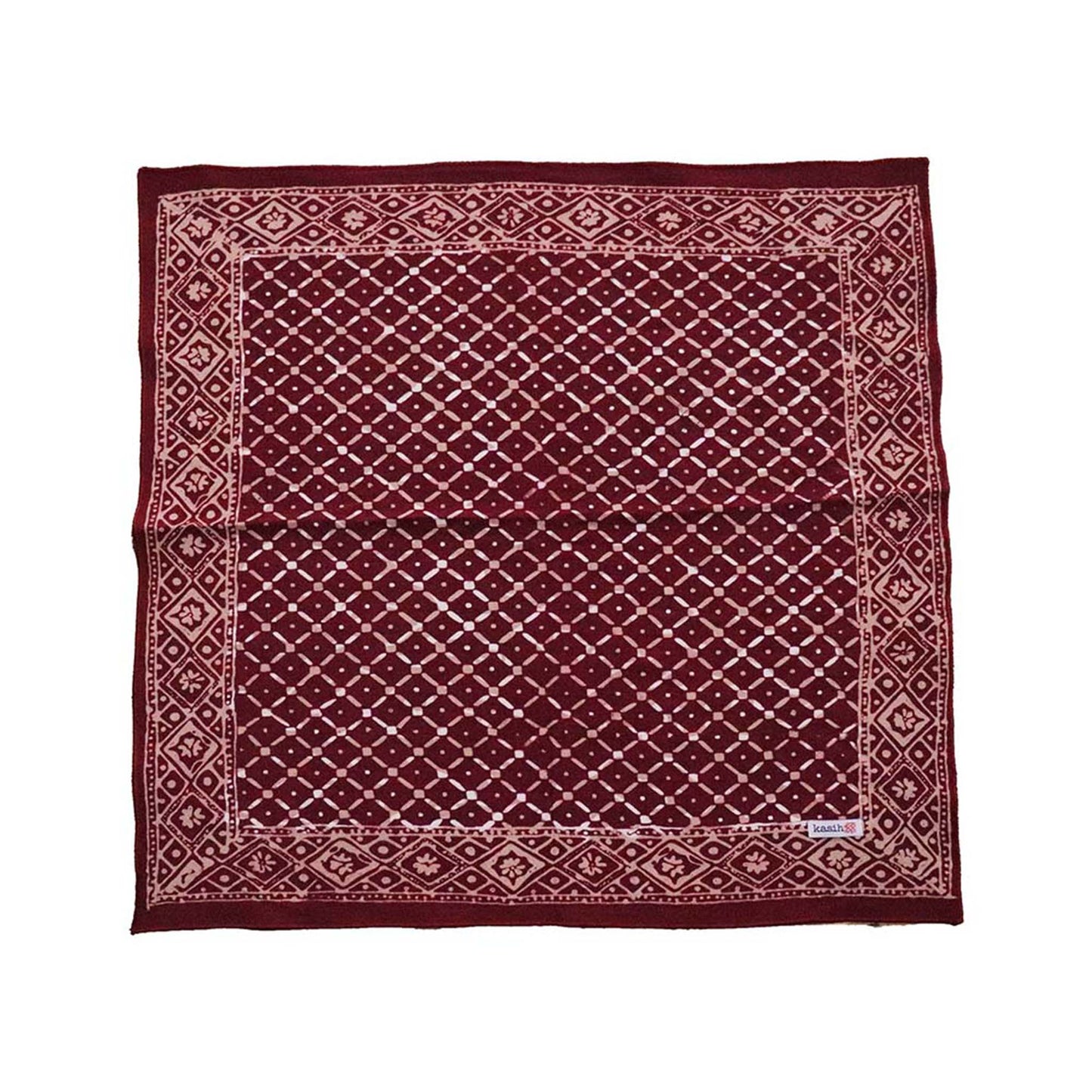 Maroon fabric with diamond pattern on a white background